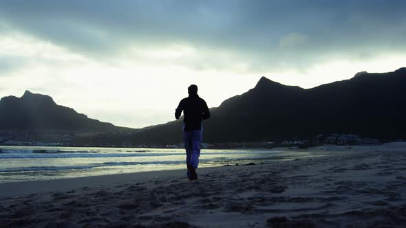 Man running on the beach