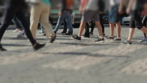 Crowd of Anonymous People Walking on Busy City Street Otdoor Sunny Day