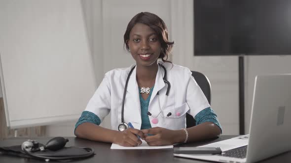 Portrait of a Young Smiling Black African American Doctor