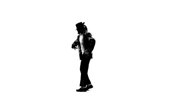 Silhouette of a Young Man Dancer Dancing in Style Michael Jackson on White Background. Close Up