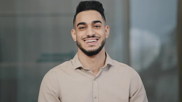 Happy Young Guy Hispanic Handsome Man with Toothy Smile Looking at Camera Male Face Portrait