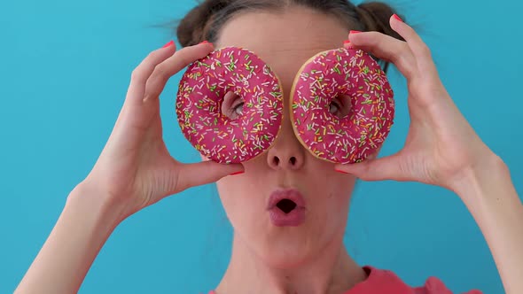 Woman with Donuts Surprised