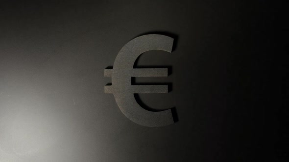 Moving Light Illuminates Euro Symbol