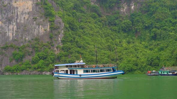 Ships Among the Rocks of the Halong Bay National Park in Vietnam Consisting of Thousands of Small