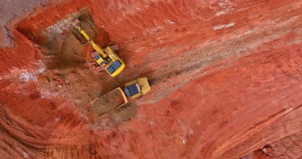 Excavator Working Backhoe Digs Ground of Preparation Process for New Residential Complex Buildings