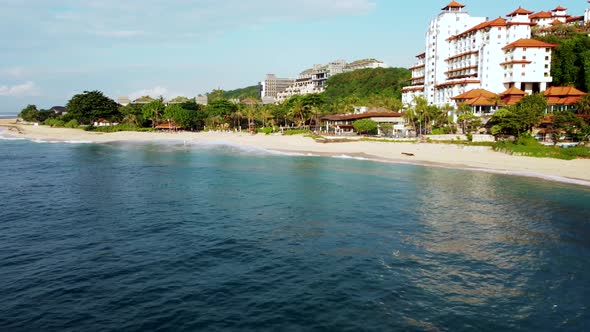 Drone Flying along the beach with hotels