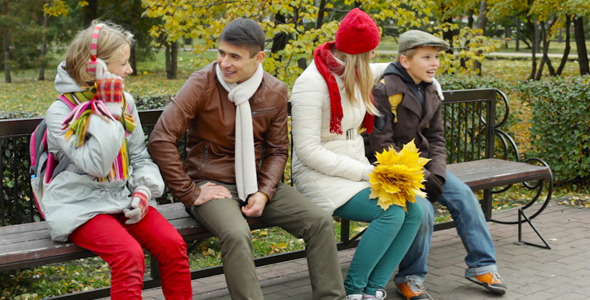 Parents And Children In Park alt