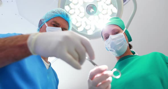 Surgeons performing operation in operation theater