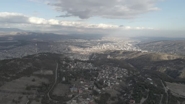 Aerial view of Okrokana district  with beautiful background of Tbilisi. Georgia