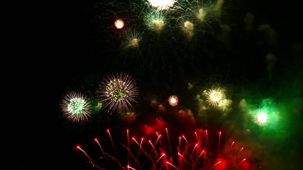 Colorful Firework display at night on sky background