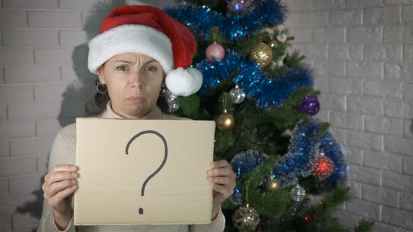 Woman with questions at Christmas day.