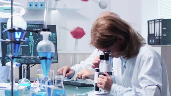 Science Team Working in Modern Laboratory
