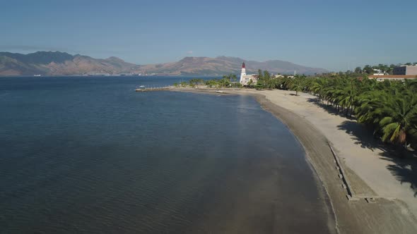 Coastline with Beach and Lighthouse