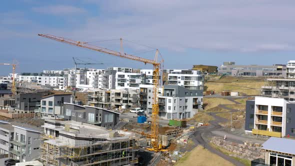 Tower Crane At Construction Site Of New Residential Houses. - aerial