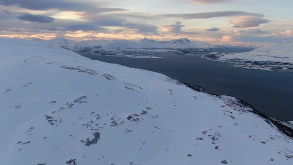 Flying over mount Storsteinen near Tromso, northern Norway, Arctic
