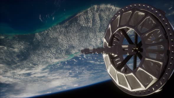 Futuristic Space Satellite Orbiting the Earth