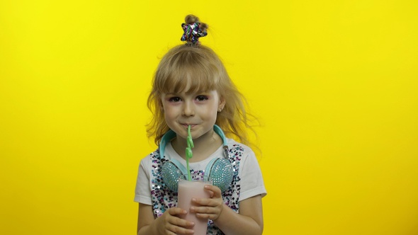 Child Drinking Milk Cocktail. Travel Blogger Tourist with Milkshake Drink. Cold Drink for Hot Summer