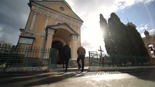 People in Church on a Sunny Morning