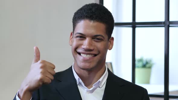Thumbs Up by Black Businessman