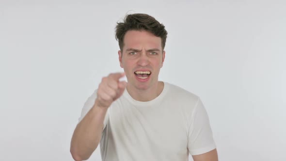 Angry Young Man Abusing on White Background