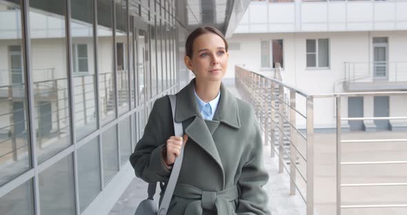 Beautiful Woman Going to Work Walking Near Business Center