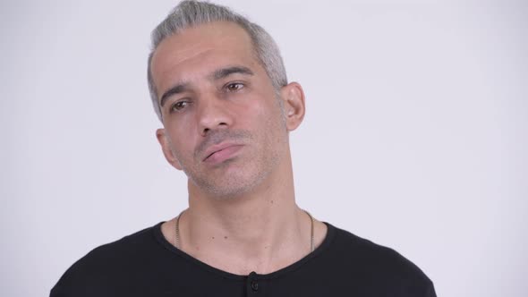 Tired Persian Man Looking Bored Against White Background