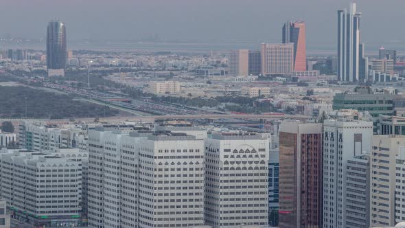 Aerial Skyline of Abu Dhabi City Centre From Above Day to Night Timelapse