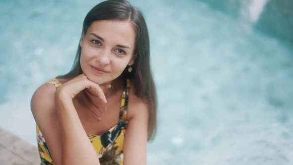 Cheerful Woman Near Swimming Pool Edge at Resort Slow Motion