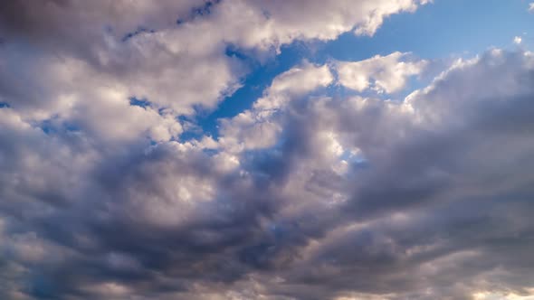 Clouds in the Blue Sky Slowly Move and Change Shape Timelapse