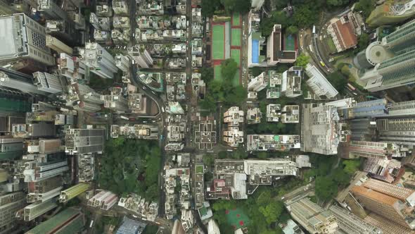 Top down aerial view of traffic in Hong Kong, following the flow of traffic