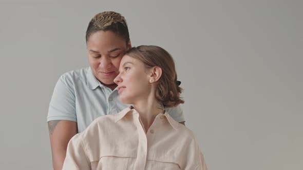 Portrait of Tender Lesbian Couple