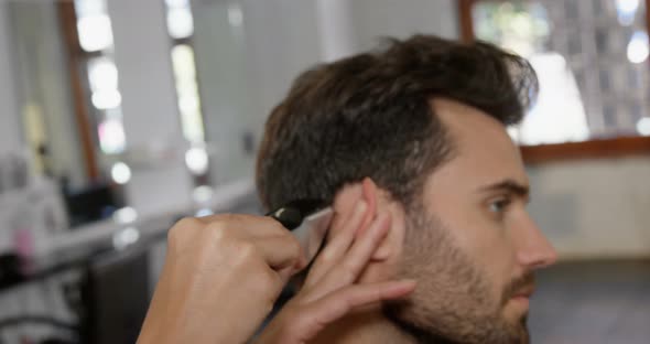 Man getting his hair trimmed