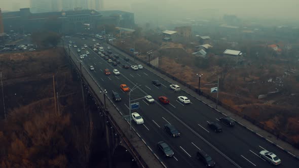 Cars Traffic Over the Bridge in the fog