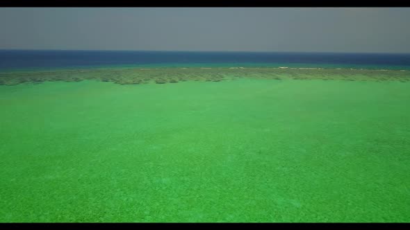 Aerial scenery of relaxing shore beach holiday by clear sea with white sand background of a dayout n