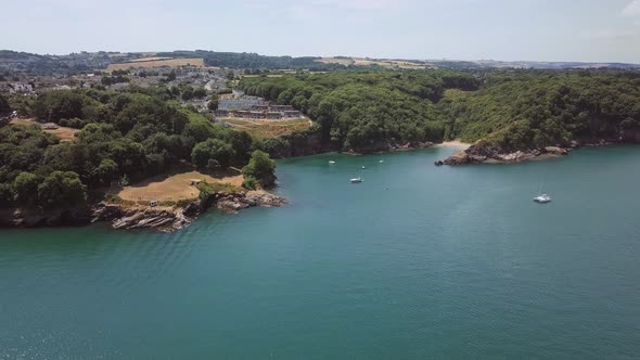 Aerial view of beach in Brixham, England. Beach cove of coast in England.