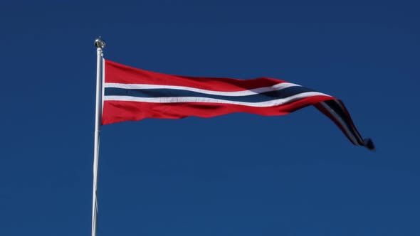Norway Pennant Flag Waving in the Wind Against Deep Blue Sky.