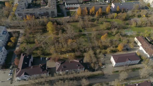 Aerial view of A park in provincial Russian city with five-story buildings. 49