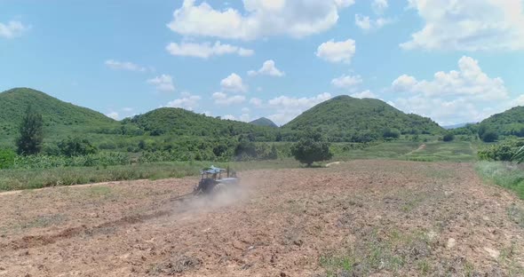 Tractor Plowing on a beatiful Landscape4K 50fpsShot on DJI PT4