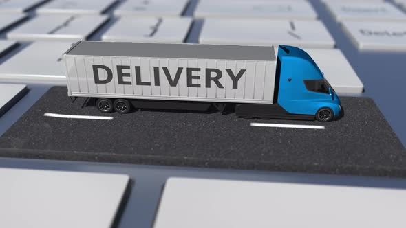 DELIVERY Text on the Truck Driving on the Keyboard Key