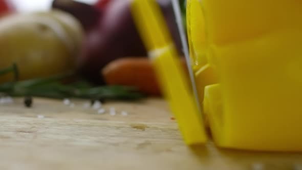 Close Up View of Cutting Slice of Bell Pepper