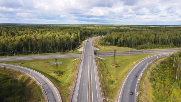 Aerial View of a Suburban Junction with a Small Number of Moving Cars