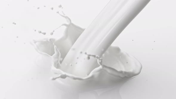 Super Slow Motion Shot of Pouring and Splashing Fresh Milk at 1000 Fps