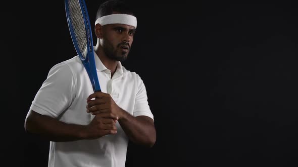 Tired Hispanic Tennis Player Preparing to Strike a Ball, Active Lifestyle, Sport