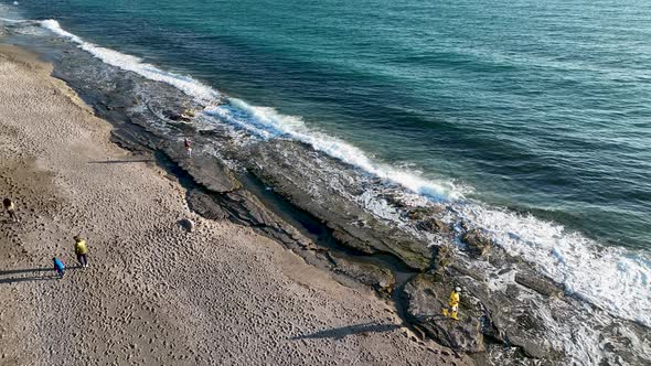 Texture of the rocky beach aerial view 4 K Turkey Alanya