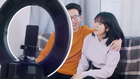 Happy Young Couple Influencers Recording New Video
