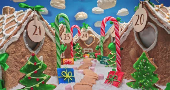 Gingerbread village and meringue clouds. Christmas gingerbread cottages.