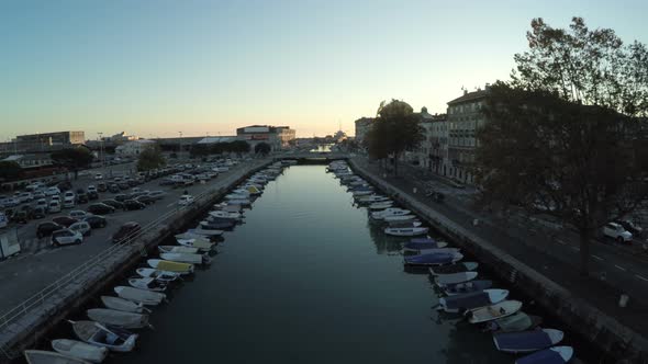 Aerial view of anchored boats at sunset