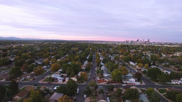 Aerial view of residential neighborhood with view of downtown Denver