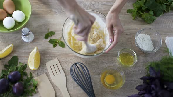 Housewife Mixing Dough in Bowl with Wooden Spoon, Recipe of Pancakes, at Bakery