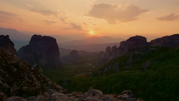 Aero, Timelapse. Sunset in the Mountains Meteors in Greece. Ancient Monasteries Are on Tops of